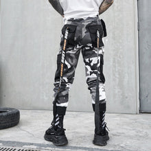 Strapped camo pants