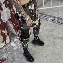 Strapped camo pants